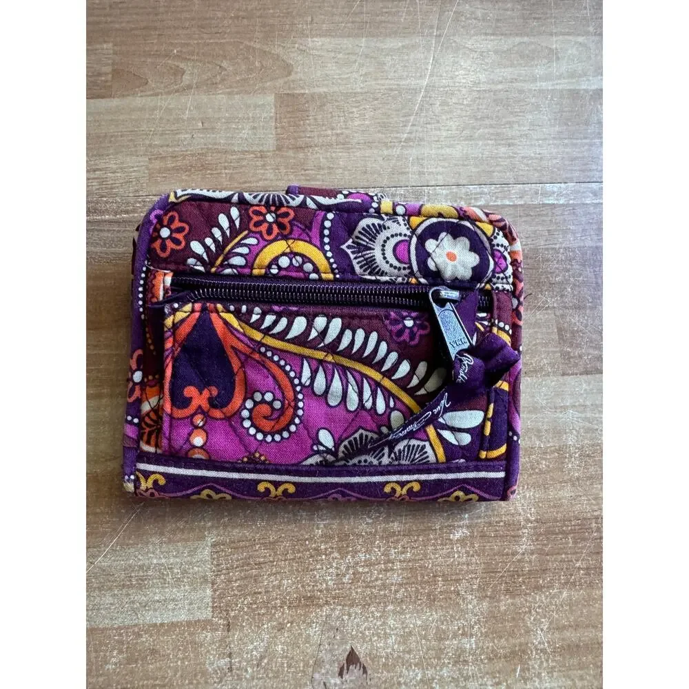 Vera Bradley Turnlock Wallet in the retired Safari Sunset pattern.